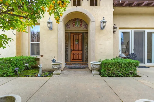 a view of a chair and table in a backyard