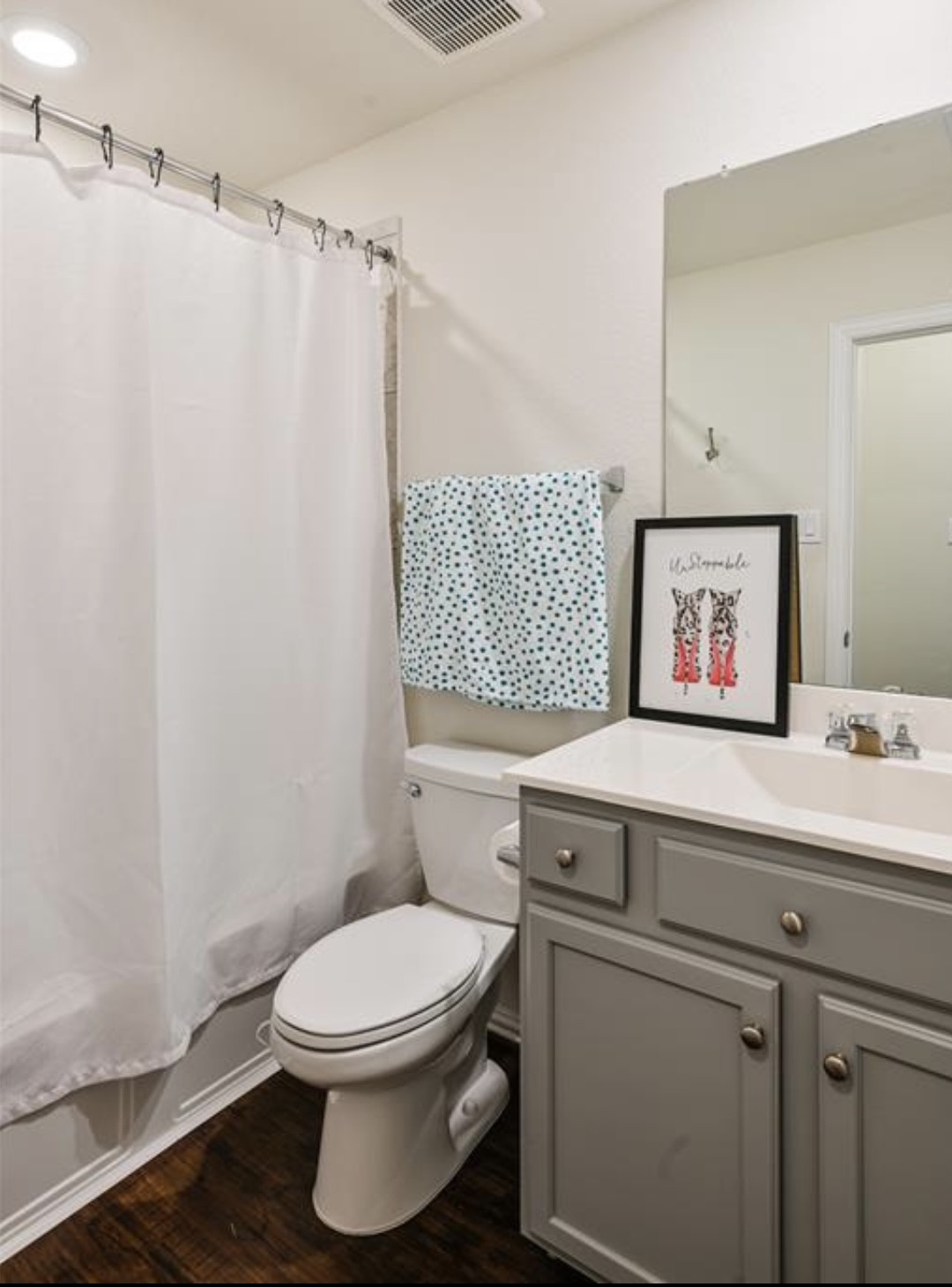 4639 Sequoia Echo Drive Spring, TX 77386 - Photo 11 of 26 a bathroom with a toilet a sink and a mirror