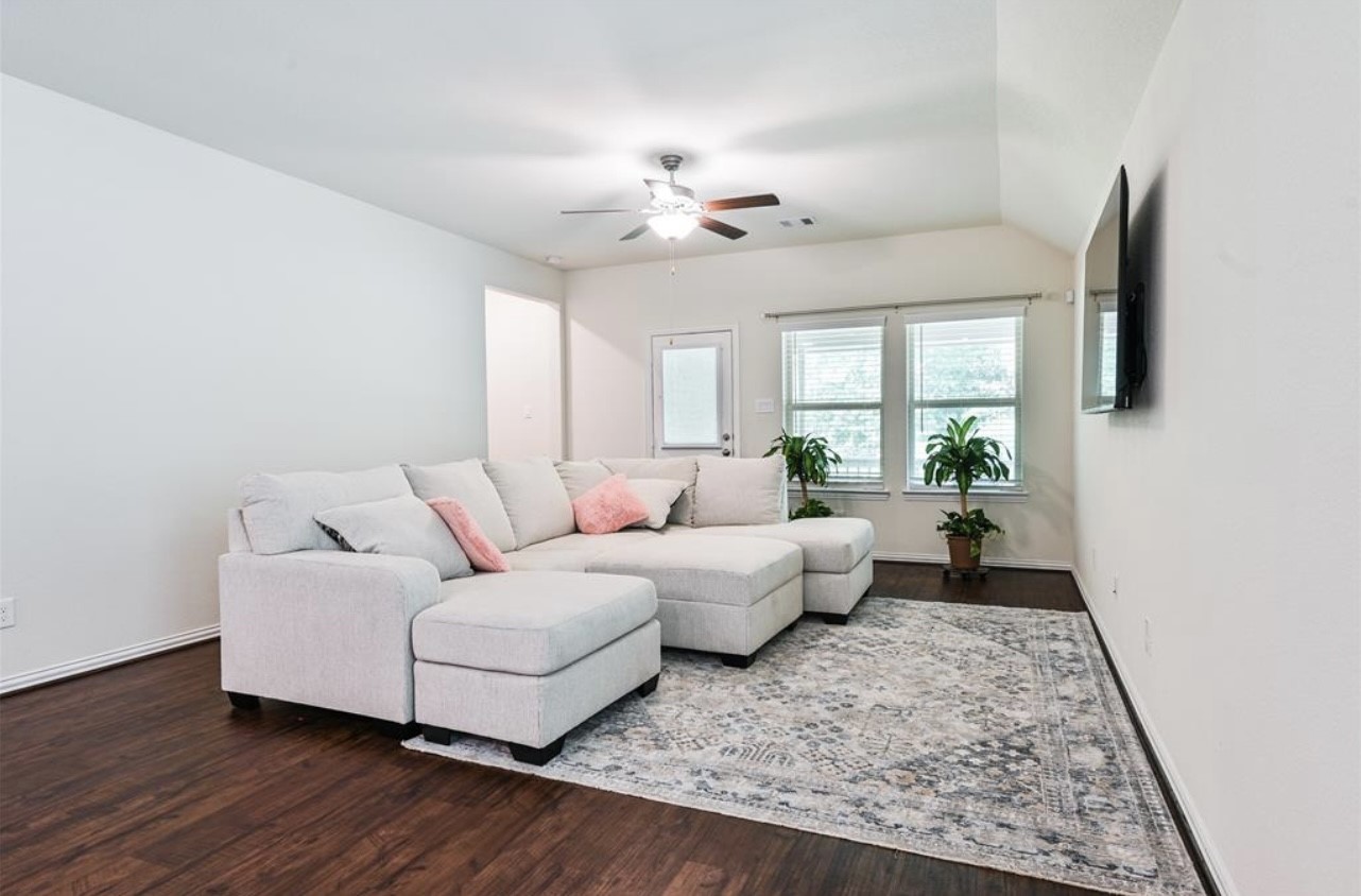 4639 Sequoia Echo Drive Spring, TX 77386 - Photo 13 of 26 a living room with furniture and a large window