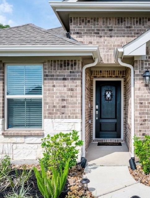 4639 Sequoia Echo Drive Spring, TX 77386 - Photo 3 of 26 a front view of a house with potted plants