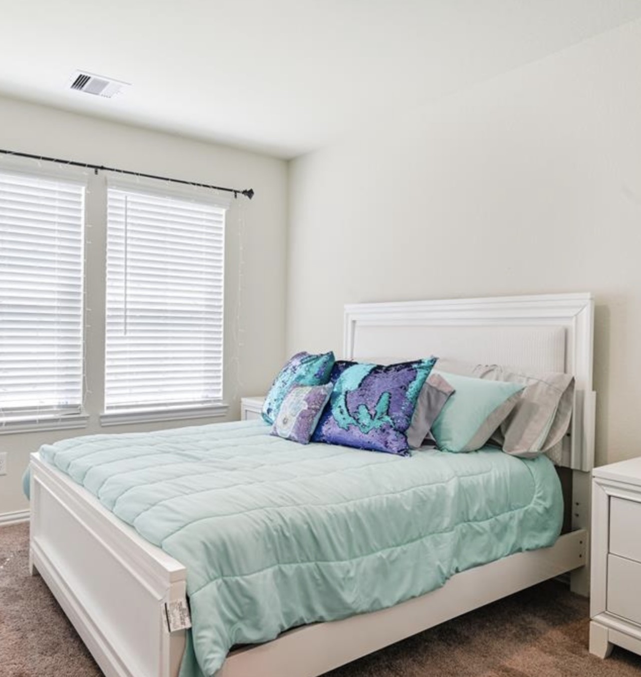 4639 Sequoia Echo Drive Spring, TX 77386 - Photo 8 of 26 a bedroom with a large bed and a wooden floor