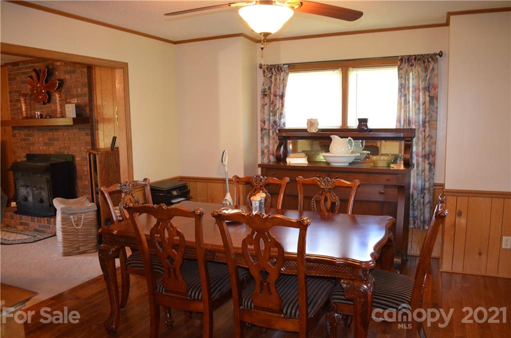 625 McEntire Road Tryon, NC 28782 - Photo 22 of 26 a view of a dining room with furniture window and outside view