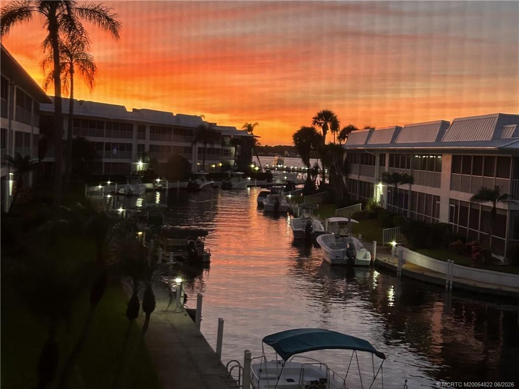 1862 Southwest Palm City Road, Unit 203 Stuart, FL 34994 - Photo 32 of 39 a view of a lake