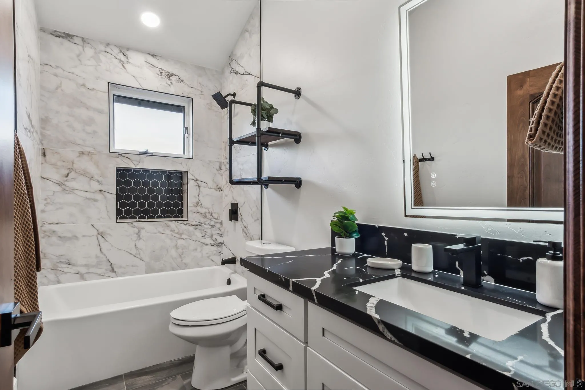 1326 Farmer Road Julian, CA 92036 - Photo 25 of 65 a bathroom with a sink a toilet and shower