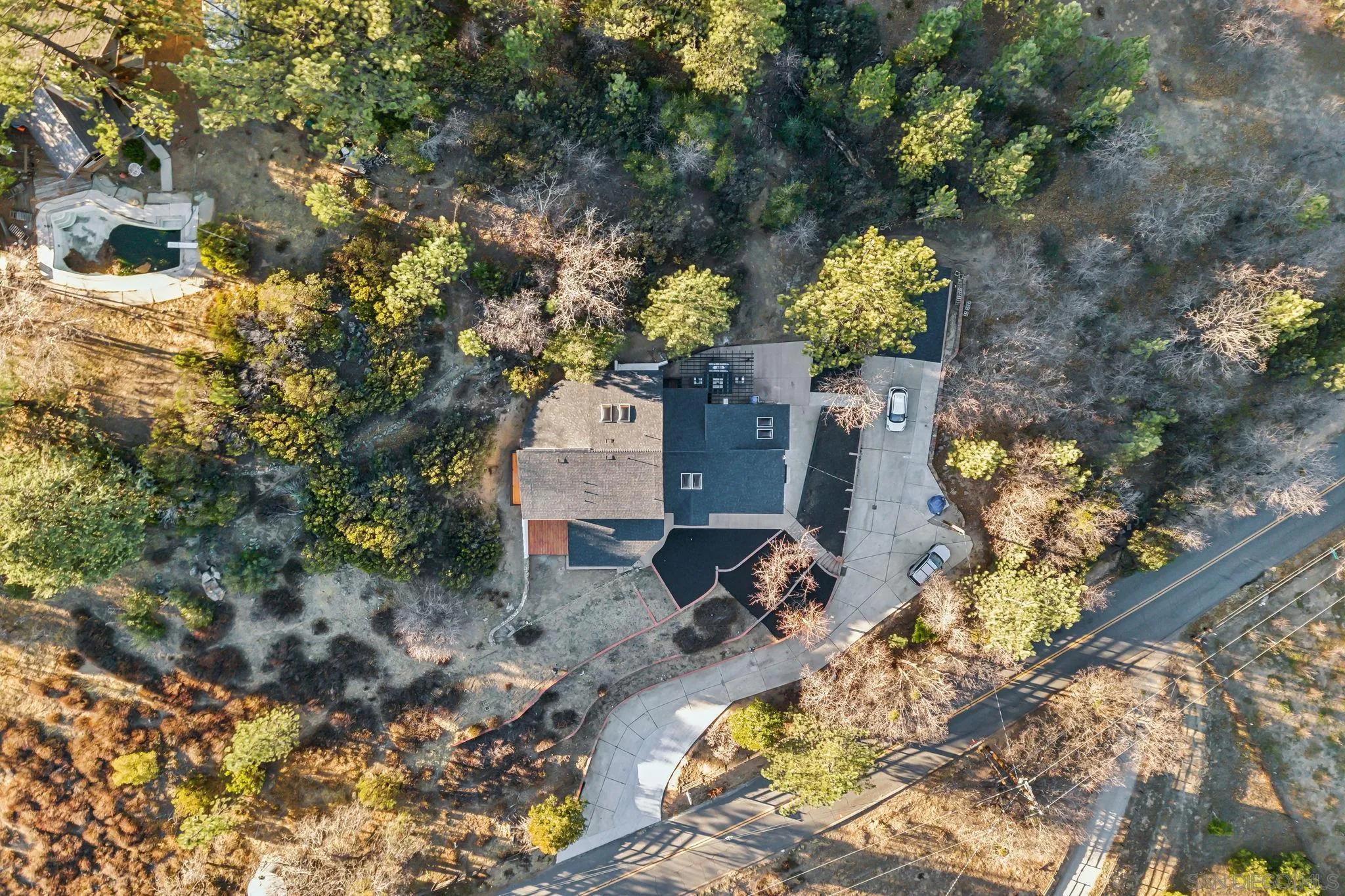 1326 Farmer Road Julian, CA 92036 - Photo 39 of 65 a backyard of a house with lots of green space