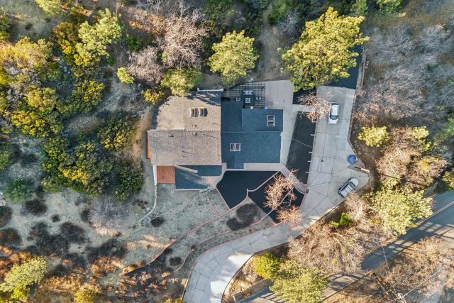 front view of a house with a dry yard
