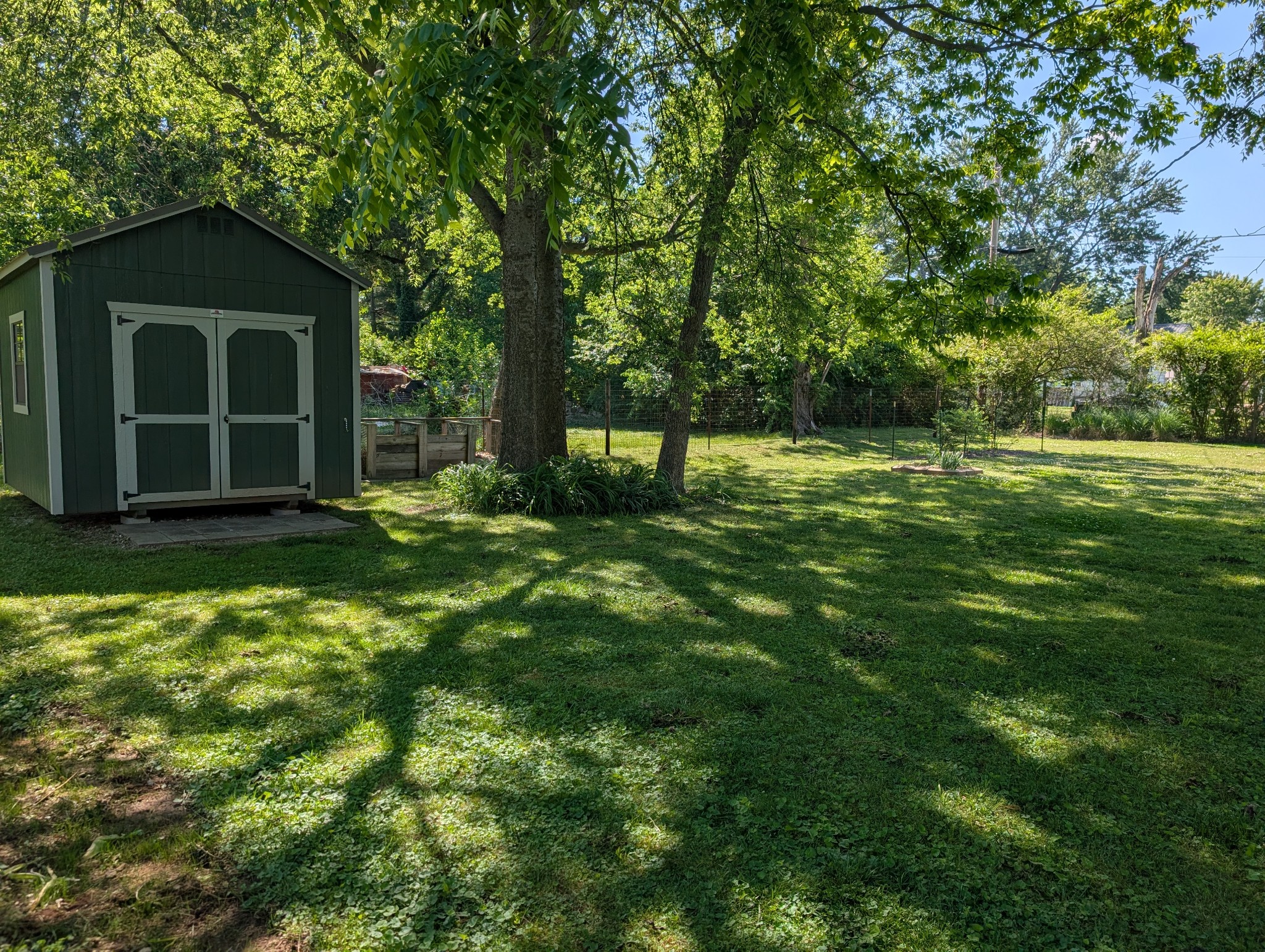 905 Nicholson Street Decherd, TN 37324 - Photo 23 of 27 a view of a house with a yard