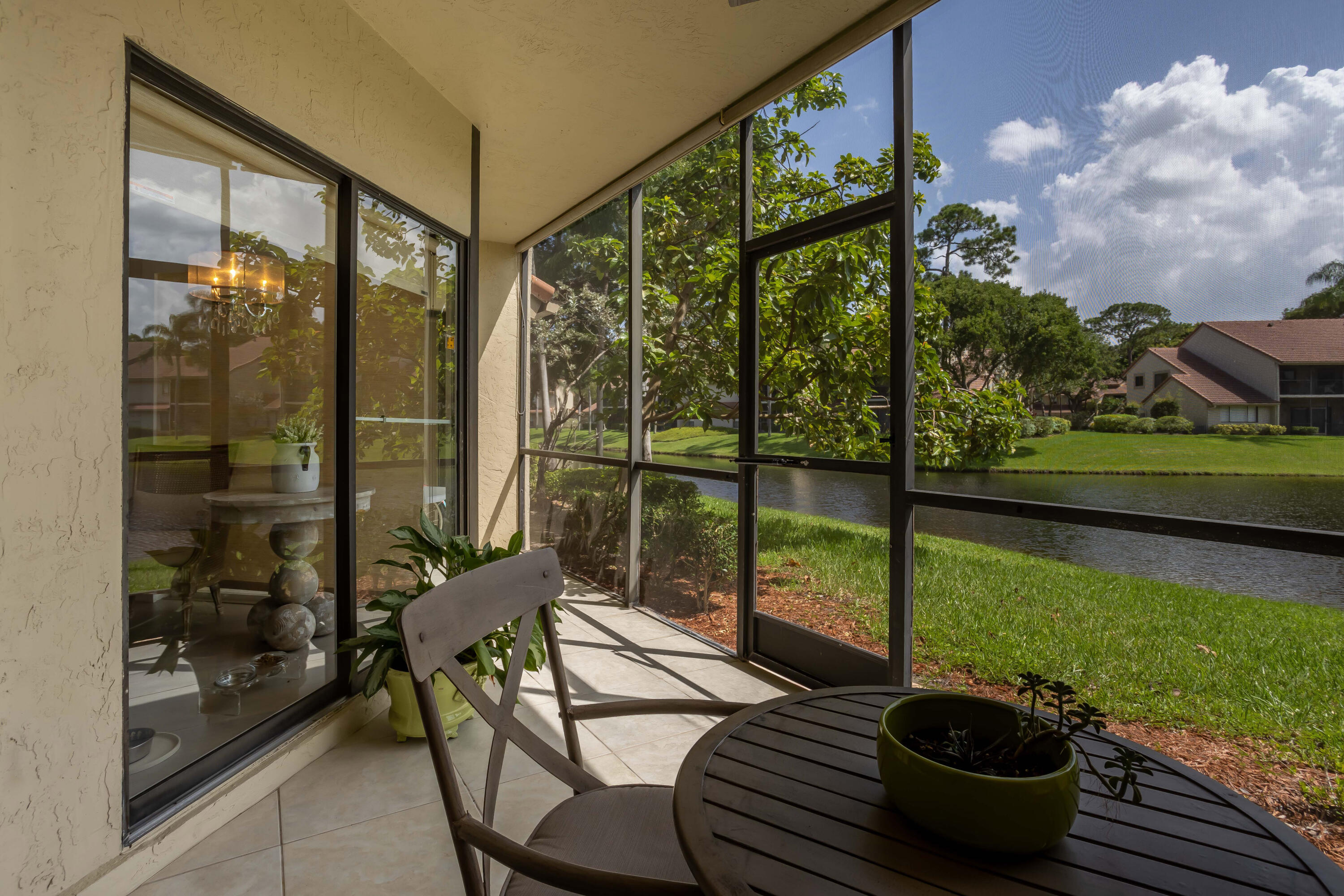 5631 Coach House Circle, Unit D Boca Raton, FL 33486 - Photo 17 of 17 Screened Patio 2