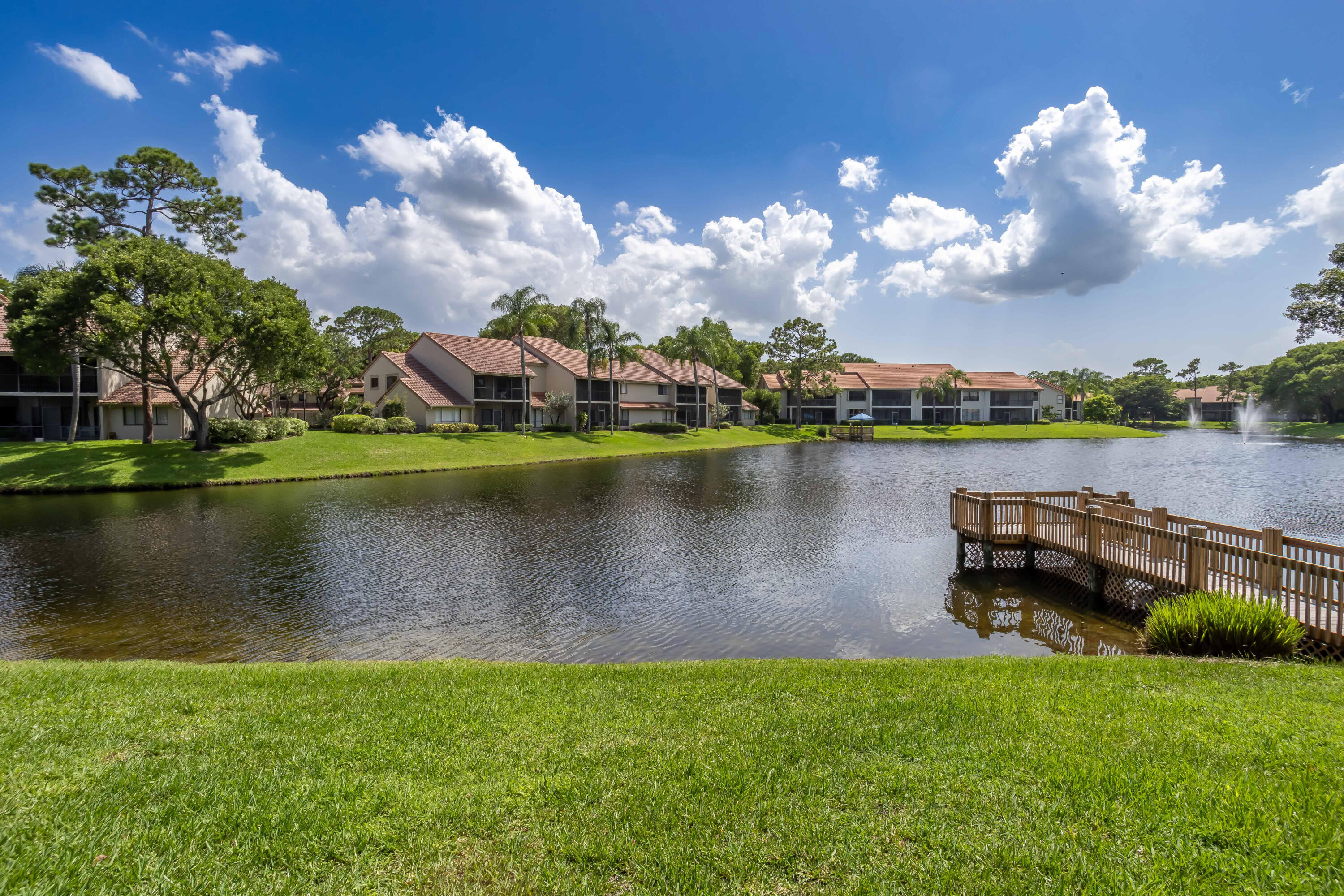 5631 Coach House Circle, Unit D Boca Raton, FL 33486 - Photo 10 of 17 Lake view w:dock