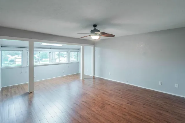 a bathroom with a bath tub with a shower