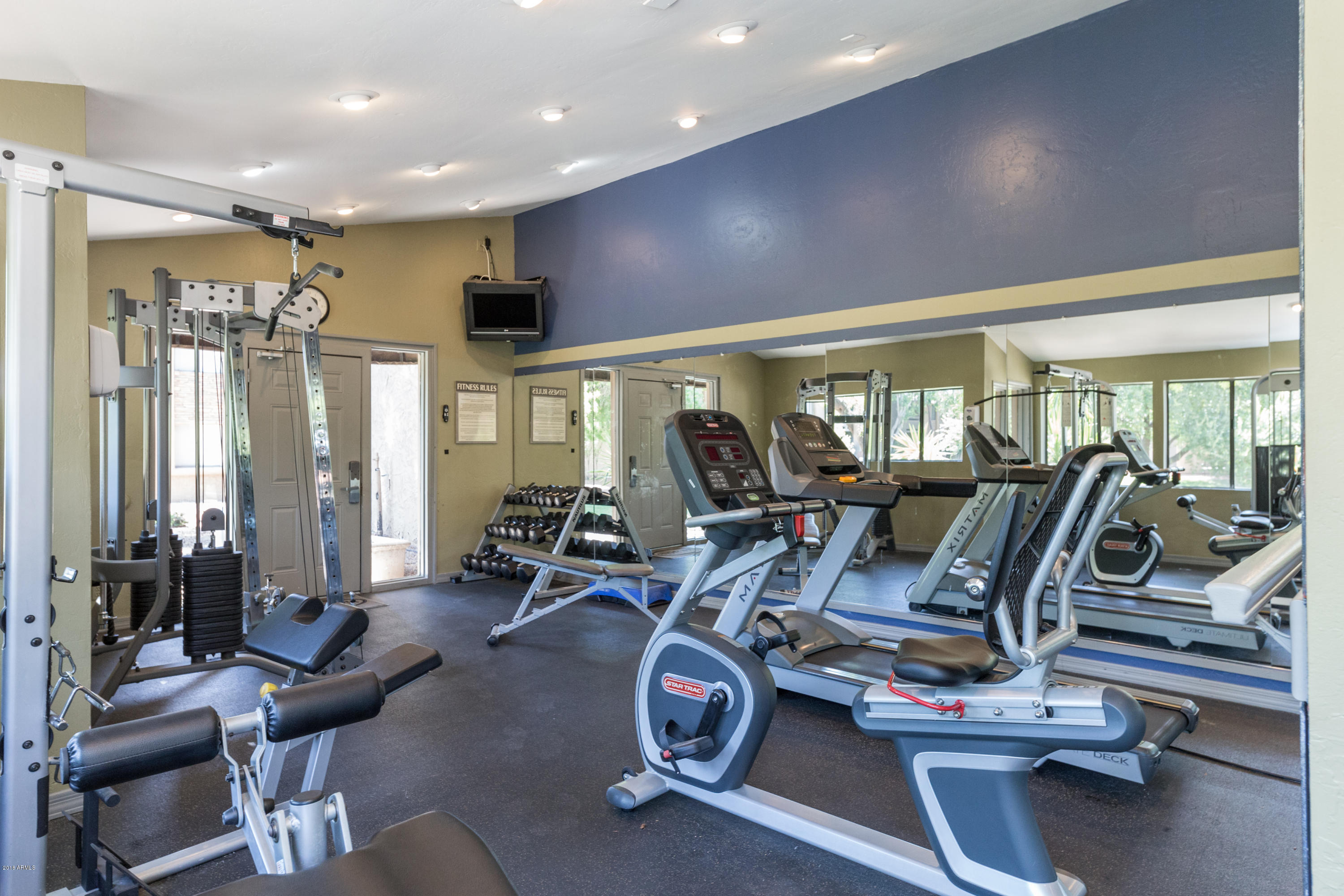 3825 East Camelback Road, Unit 249 Phoenix, AZ 85018 - Photo 27 of 30 a view of a room with gym equipment