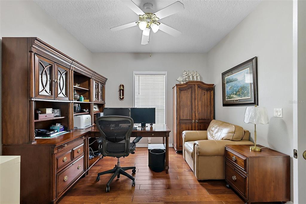 3584 Tropical Seas Loop Tavares, FL 32778 - Photo 12 of 49 a living room with furniture and a window