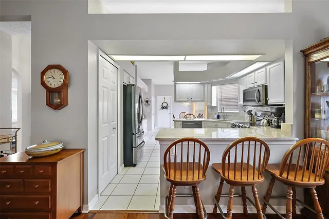 a spacious bathroom with a double vanity sink mirror and