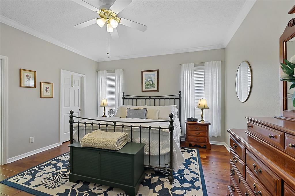 3584 Tropical Seas Loop Tavares, FL 32778 - Photo 21 of 49 a living room with furniture a chandelier and a mirror