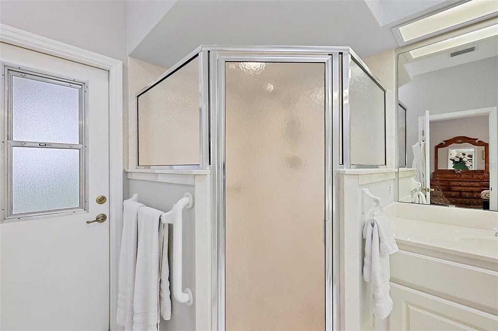 3584 Tropical Seas Loop Tavares, FL 32778 - Photo 26 of 49 a view of a bedroom from the hallway