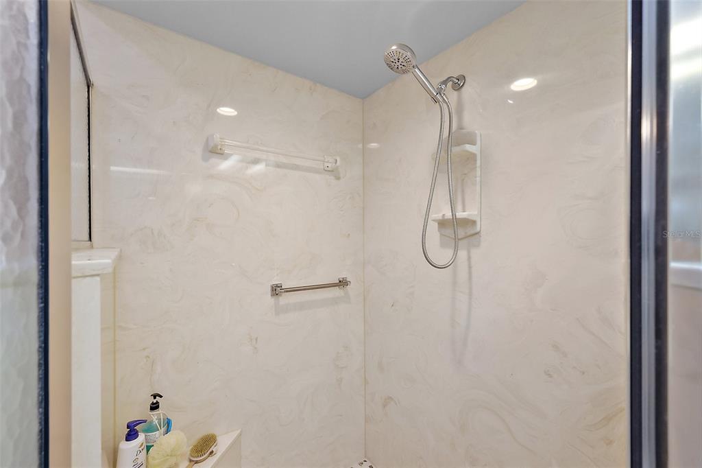 3584 Tropical Seas Loop Tavares, FL 32778 - Photo 27 of 49 a bathroom with a shower