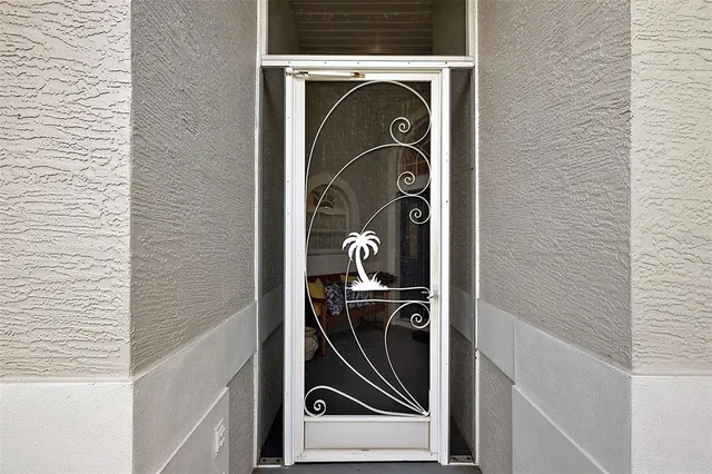 a view of workspace with window and wooden floor