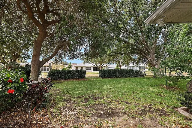 an aerial view of a house with a garden