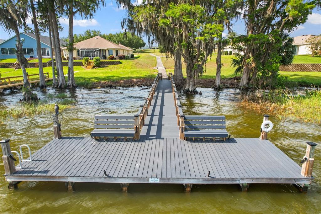 3584 Tropical Seas Loop Tavares, FL 32778 - Photo 41 of 49 a view of swimming pool with outdoor seating and yard