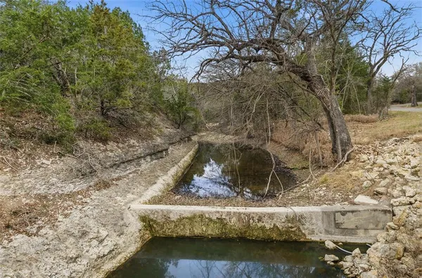 a view of a lake with a mountain