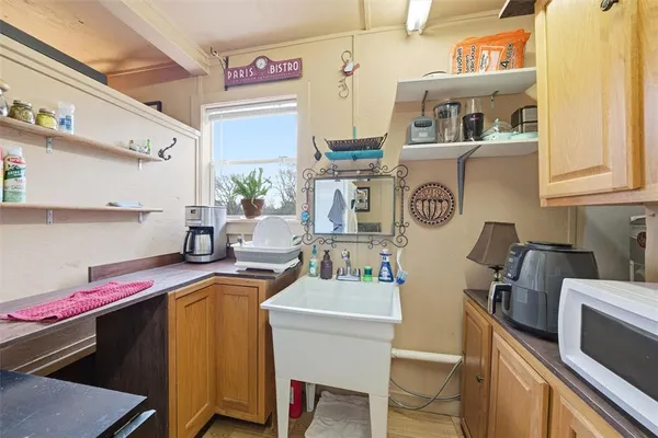 a room with furniture a washer and dryer