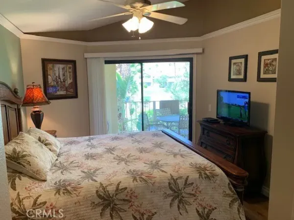 a bathroom with a toilet and a window