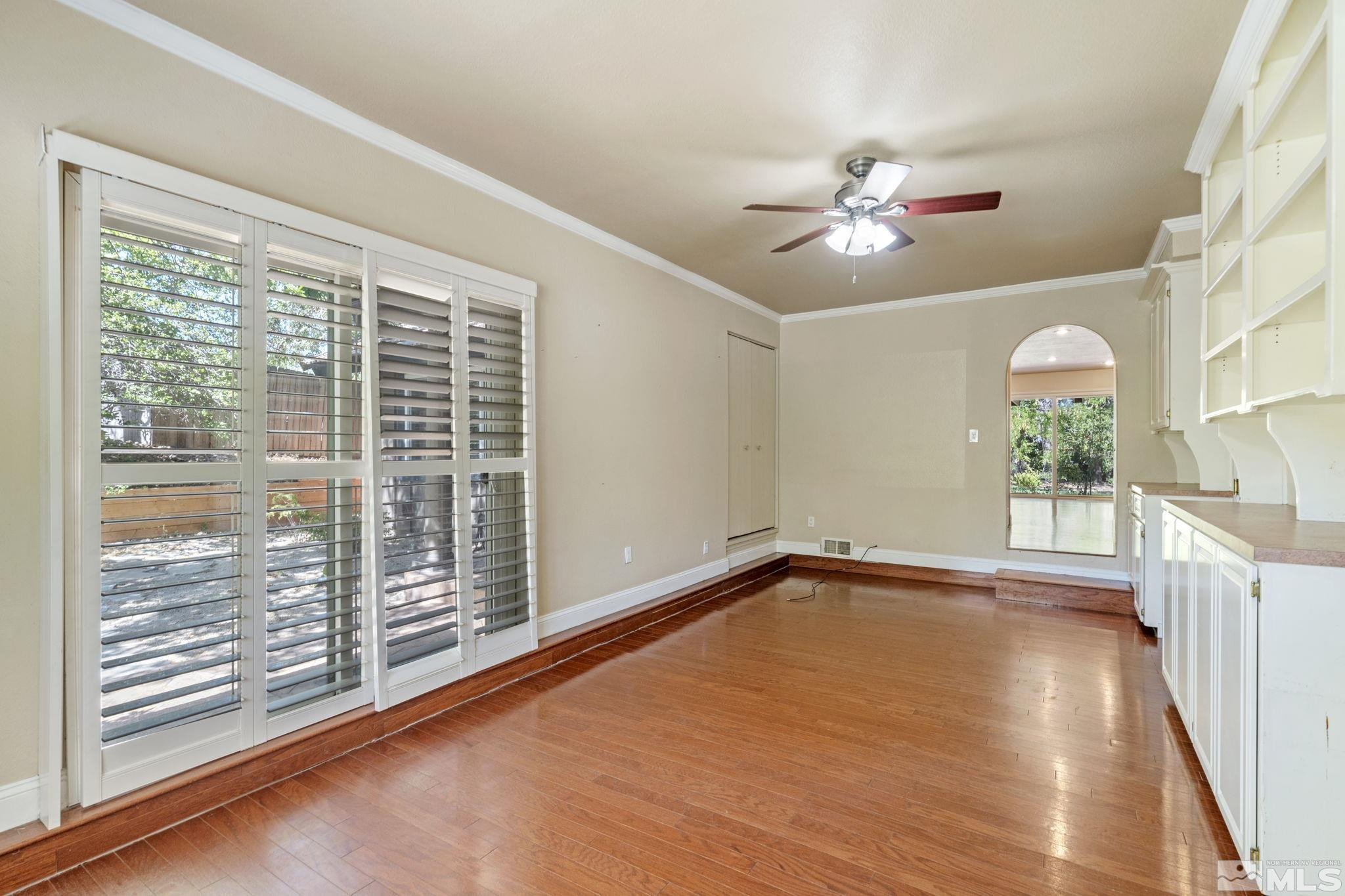 2197 Solitude Drive Reno, NV 89511 - Photo 25 of 40 a view of a livingroom with a ceiling fan and window