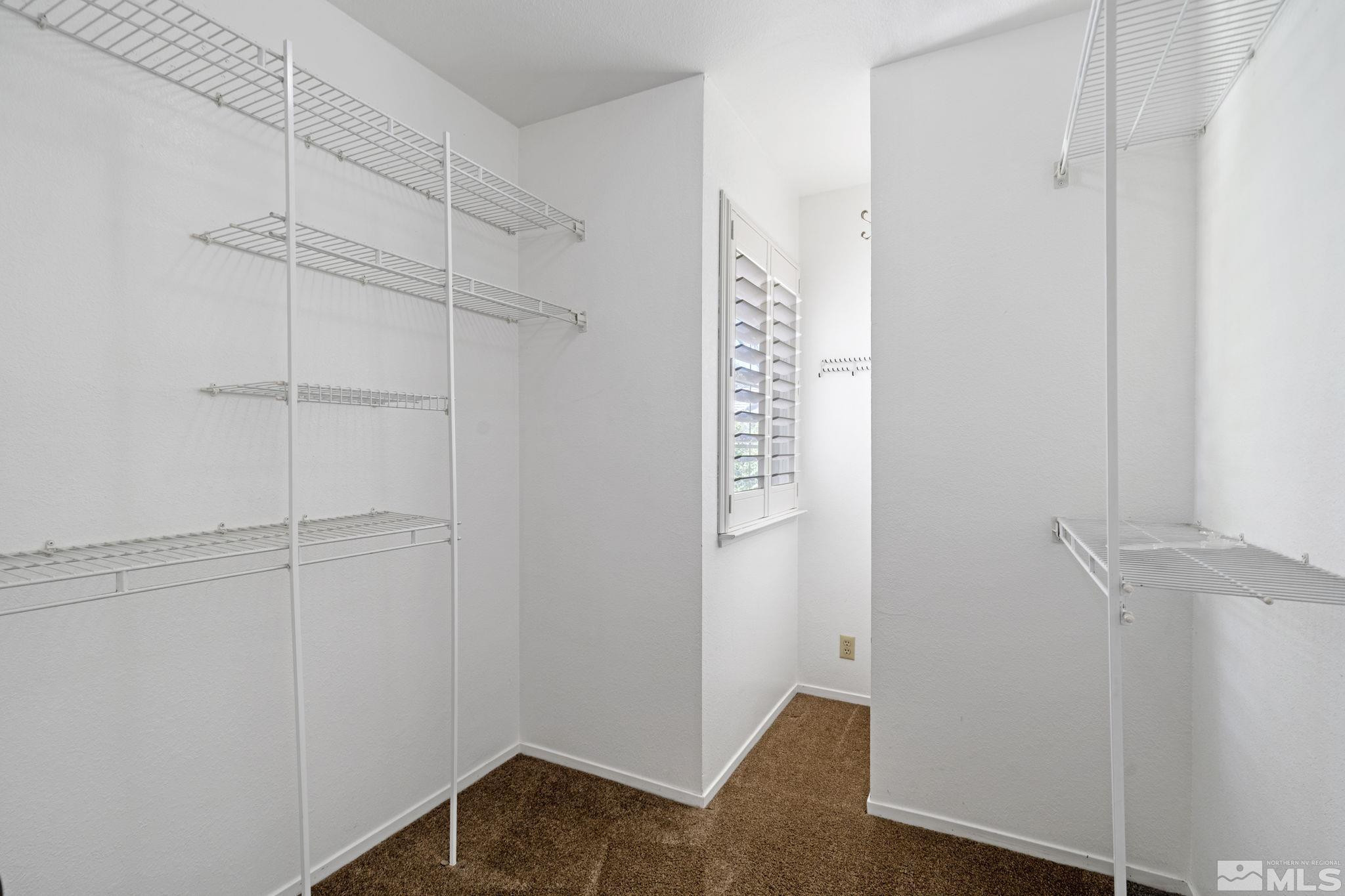 2197 Solitude Drive Reno, NV 89511 - Photo 33 of 40 a view of small space with racks on the wall