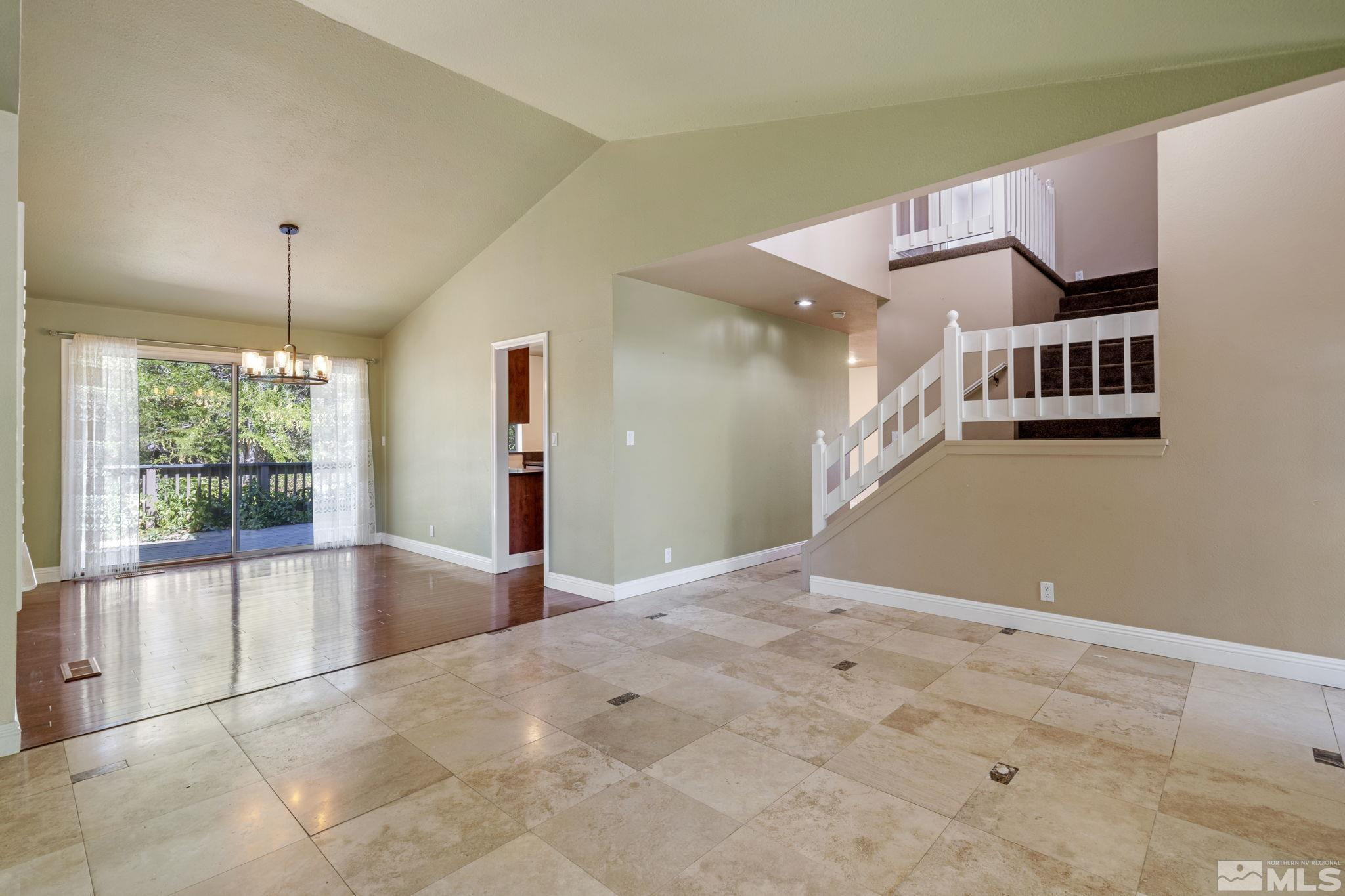 2197 Solitude Drive Reno, NV 89511 - Photo 9 of 40 a view of an empty room with a window