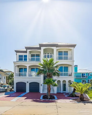 a front view of building with yard