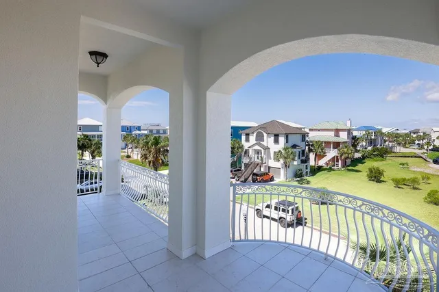 a view of a porch and garden
