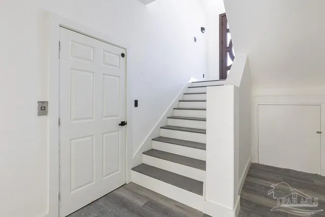 a view of entryway with wooden floor