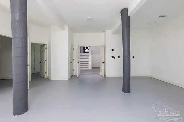 a view of empty room with closet