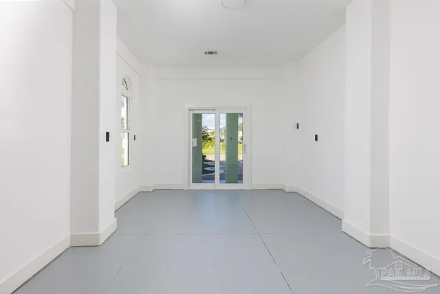 a view of an empty room with window