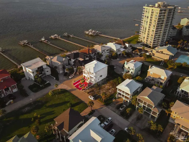 an aerial view of a building with outdoor space