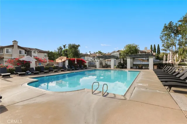 a view of a swimming pool with a patio