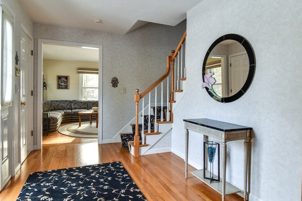 10 Sundance Way Natick, MA 01760 - Photo 22 of 40 a bedroom with furniture and a window