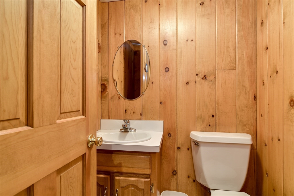 10 Sundance Way Natick, MA 01760 - Photo 35 of 40 a bathroom with a sink a toilet and shower