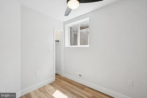 a view of small space with wooden floor