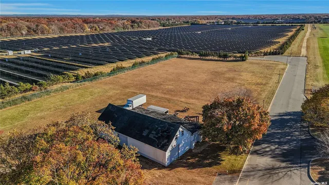 a view of a balcony with an outdoor space and seating area