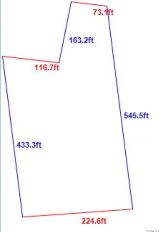 a view of a yard with ocean view