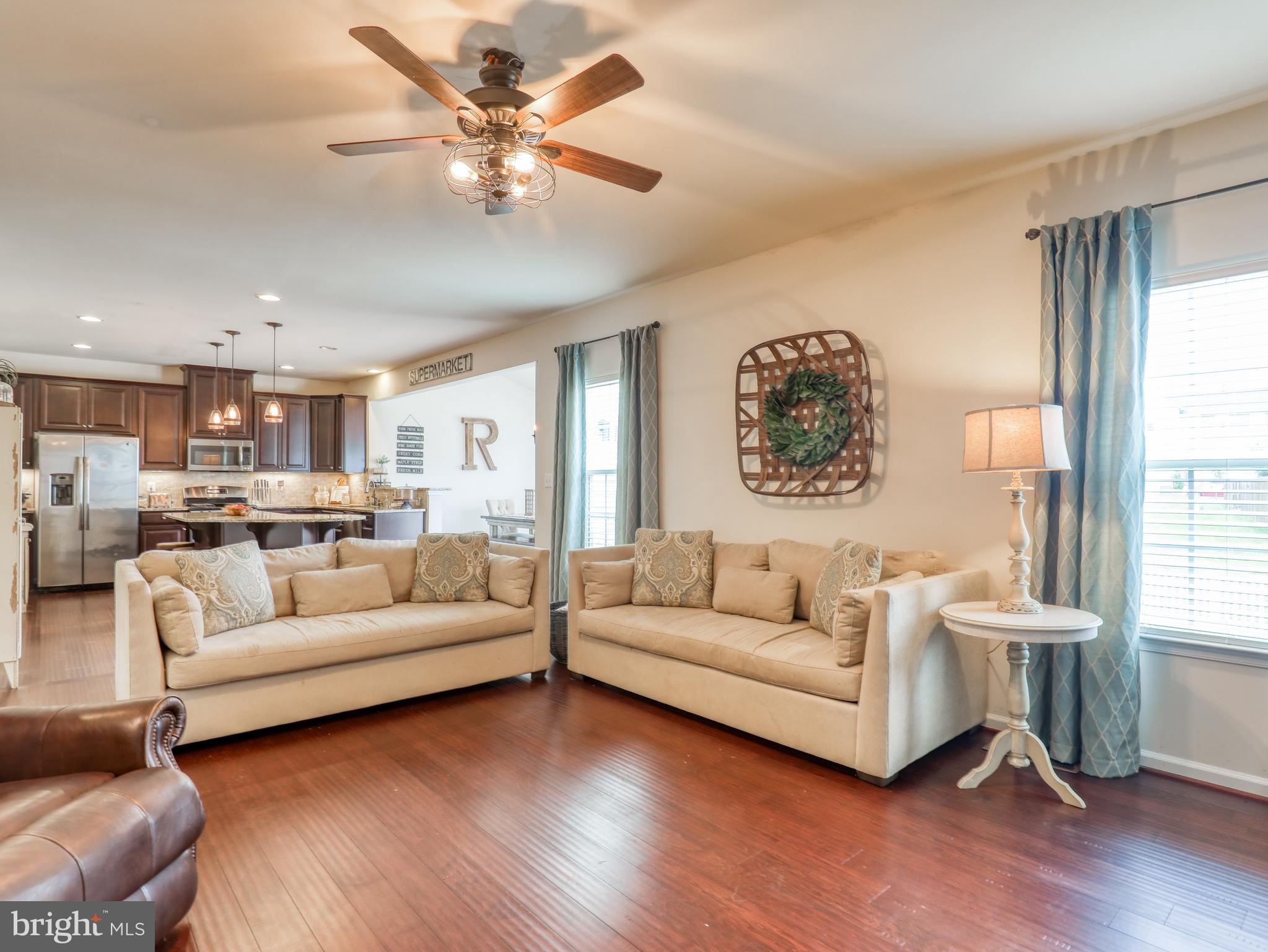111 Pinwheel Court Stephenson, VA 22656 - Photo 12 of 43 Family room opens to kitchen