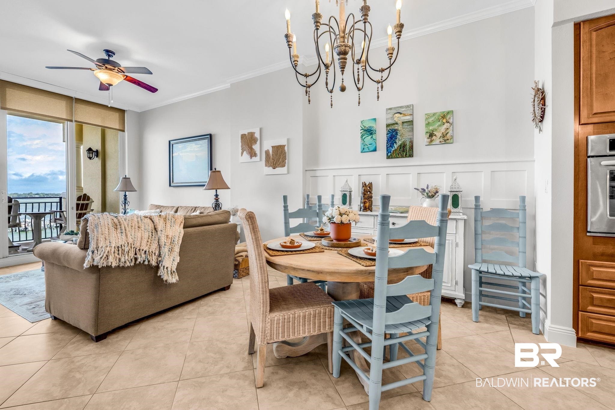 14500 River Road, Unit 305 Pensacola, FL 32507 - Photo 8 of 42 Open-concept living area with large format tile flooring and a ceiling fan