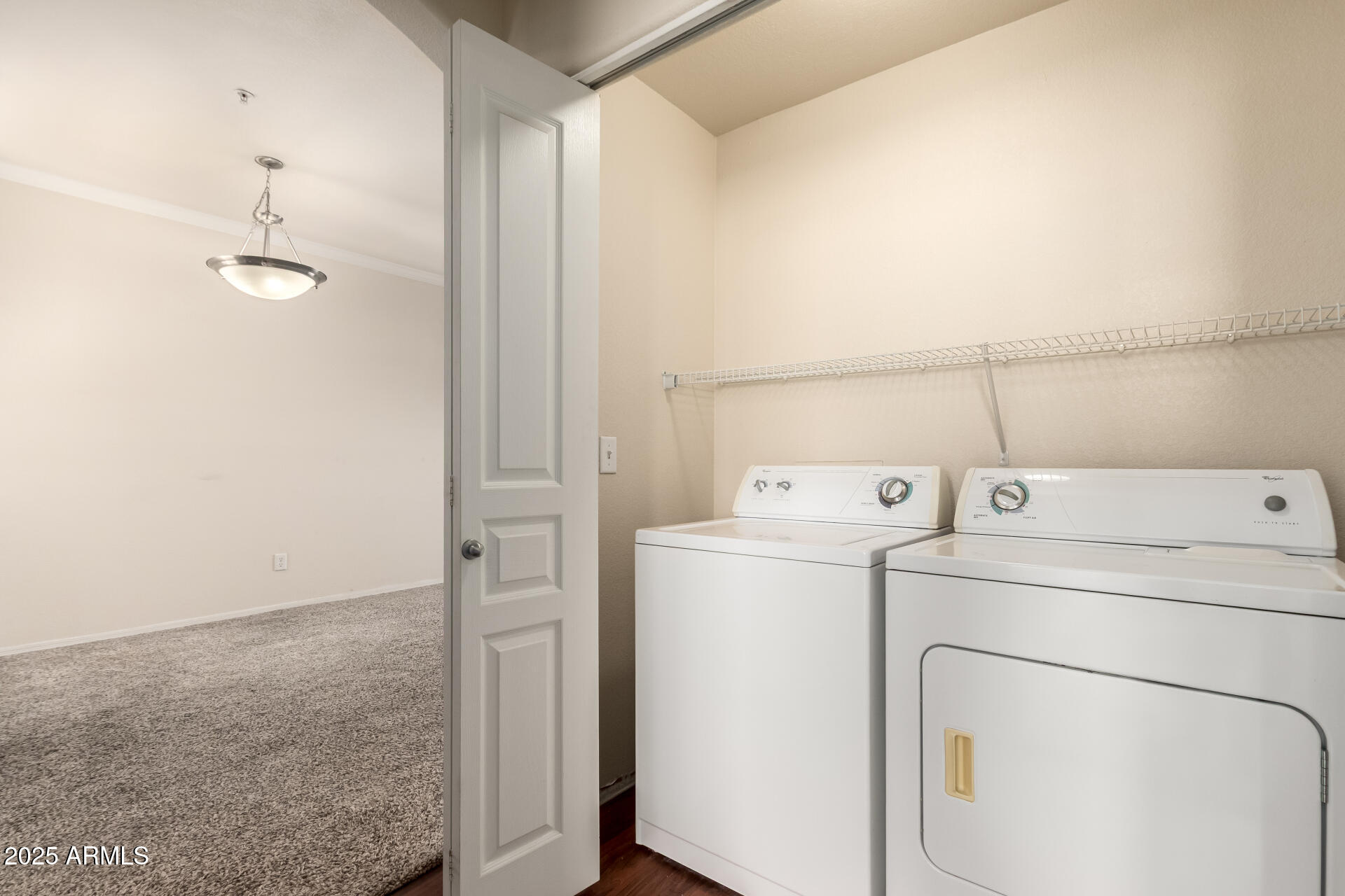 1941 South Pierpont Drive, Unit 2141 Mesa, AZ 85206 - Photo 14 of 29 a utility room with dryer and washer