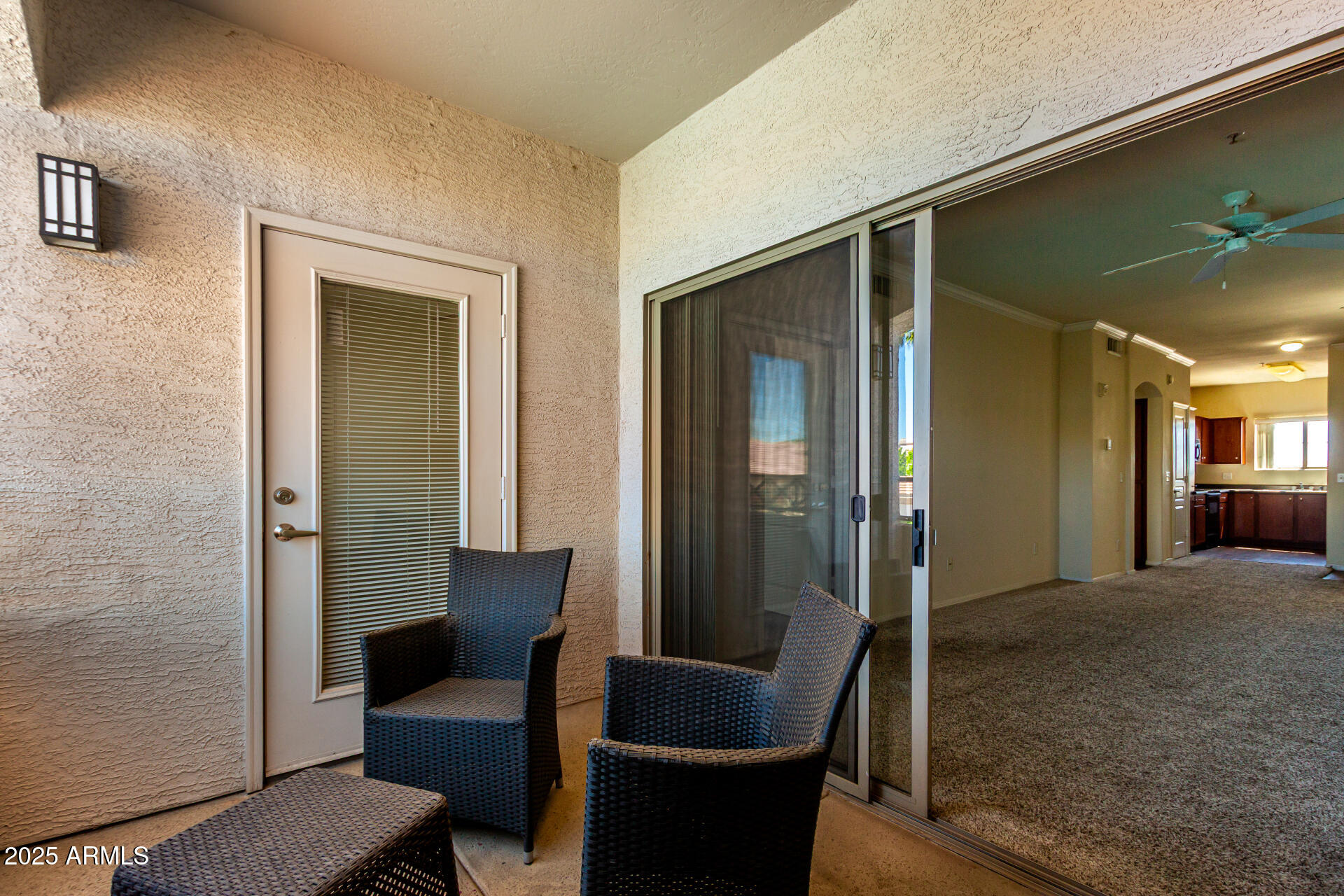 1941 South Pierpont Drive, Unit 2141 Mesa, AZ 85206 - Photo 15 of 29 a balcony with furniture and a potted plant