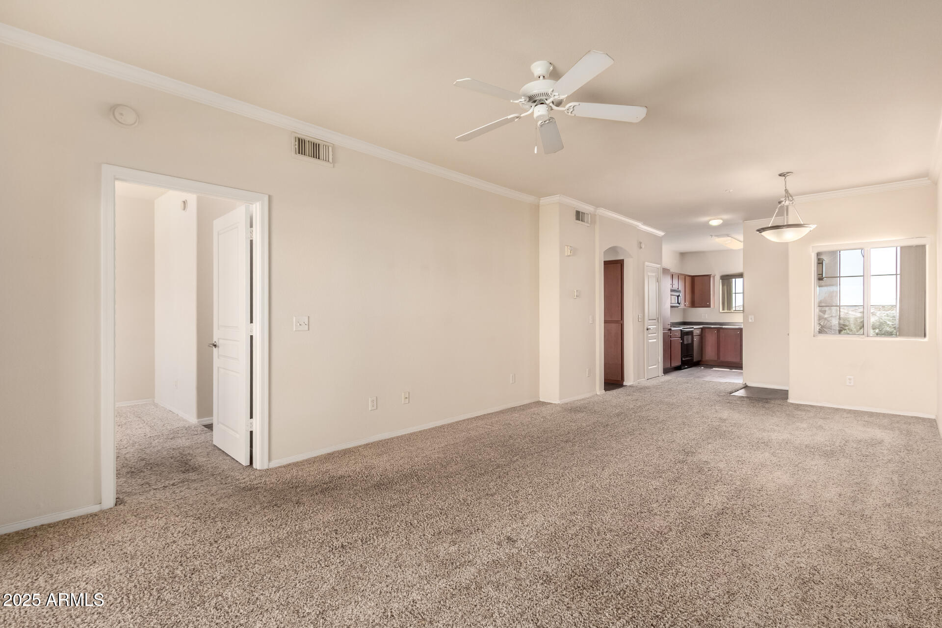 1941 South Pierpont Drive, Unit 2141 Mesa, AZ 85206 - Photo 4 of 29 a view of an empty room with a window