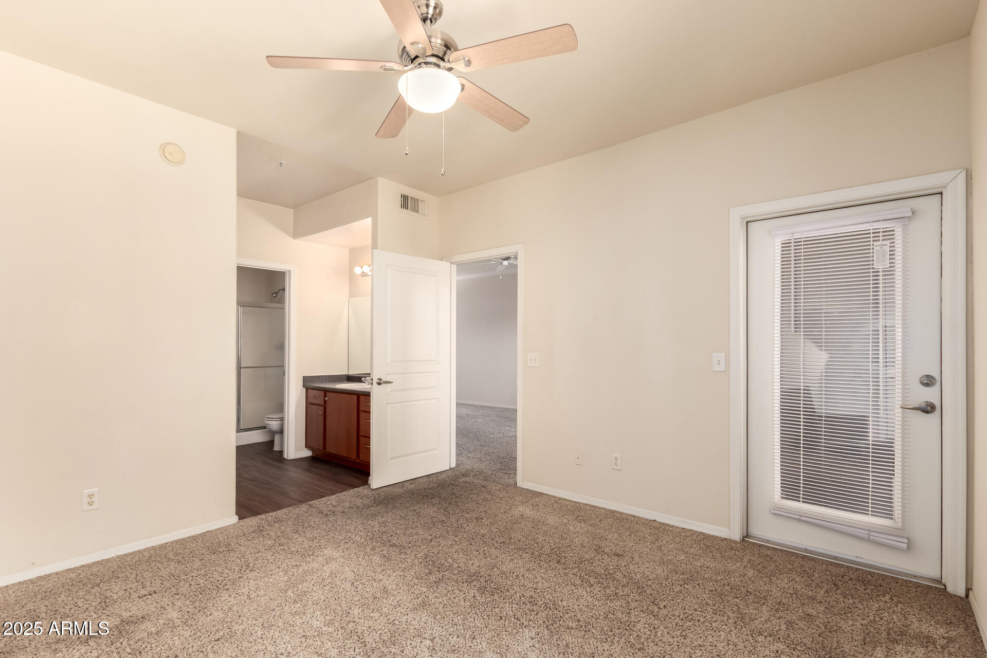 1941 South Pierpont Drive, Unit 2141 Mesa, AZ 85206 - Photo 9 of 29 a view of a kitchen with a sink and a refrigerator