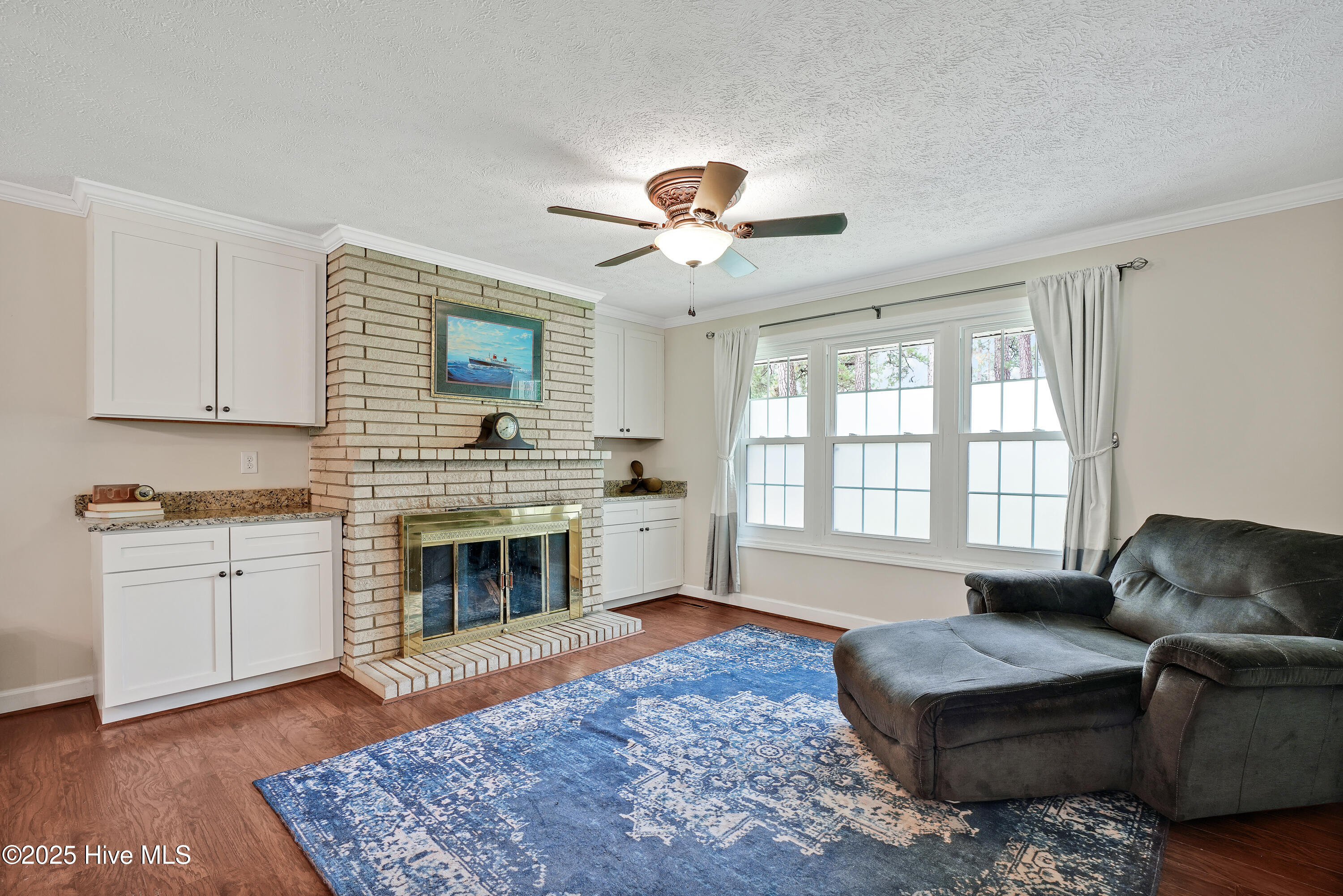 354 Golf Course Road Whiteville, NC 28472 - Photo 9 of 40 Wood Burning Fireplace with Built in Cabinets