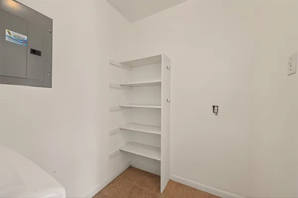 a view of a room with rack on the wall