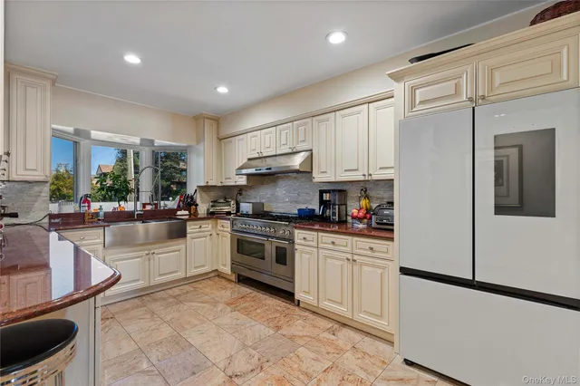 a bedroom with a bed and a tv